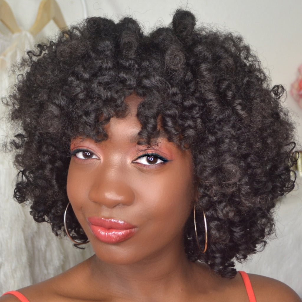 Tutorial: Felicia Mesadieu Creates Stunning Bantu Knot Out Updo